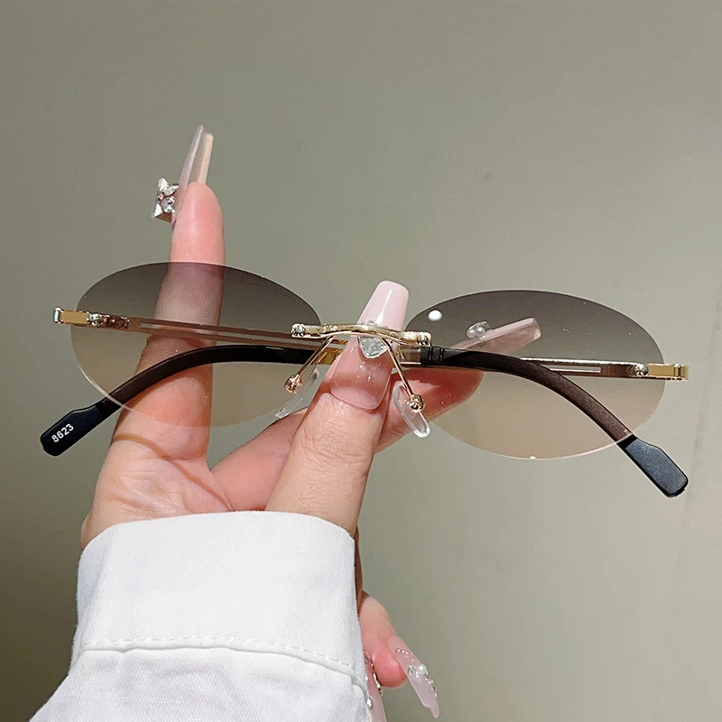Gafas de sol ovaladas sin mont - Designer Sunglasses reseña y precio